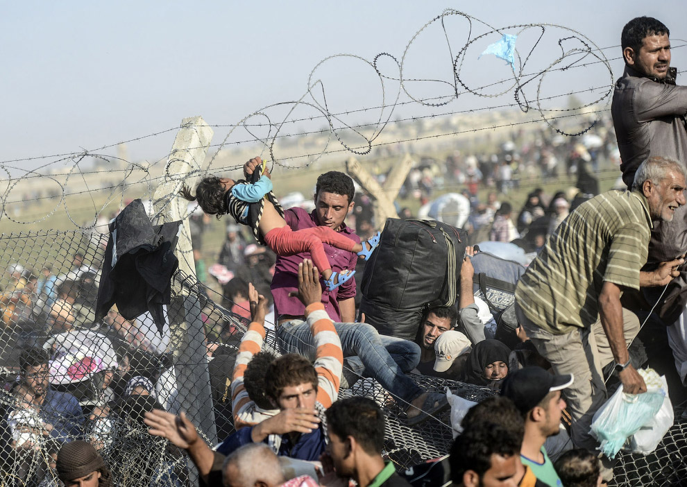 Сирийцы, бегущие от войны в Турцию (Фоторепортаж)