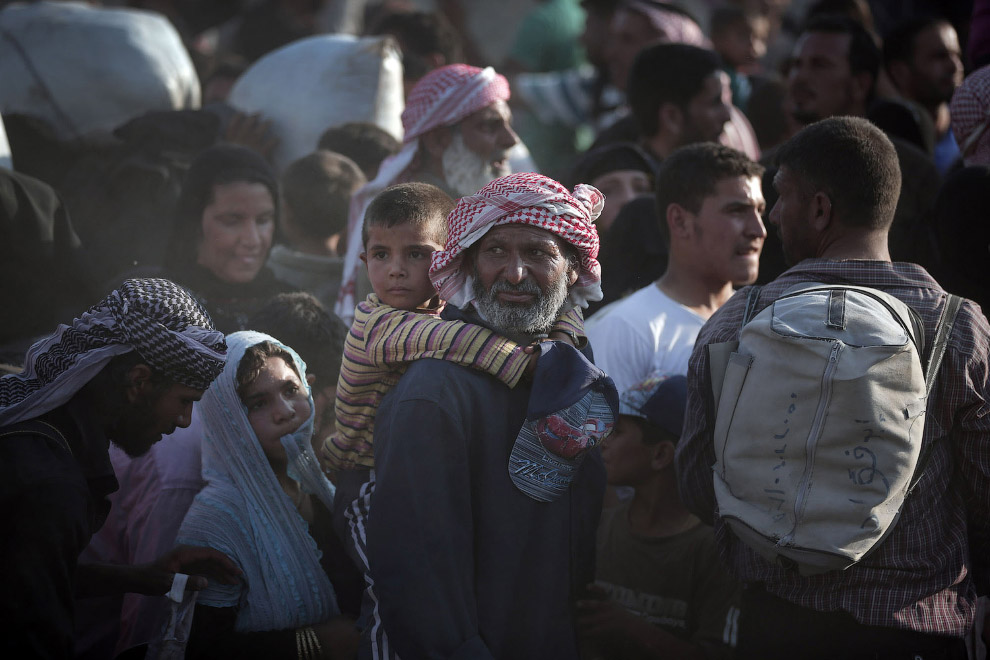 Сирийцы, бегущие от войны в Турцию (Фоторепортаж)